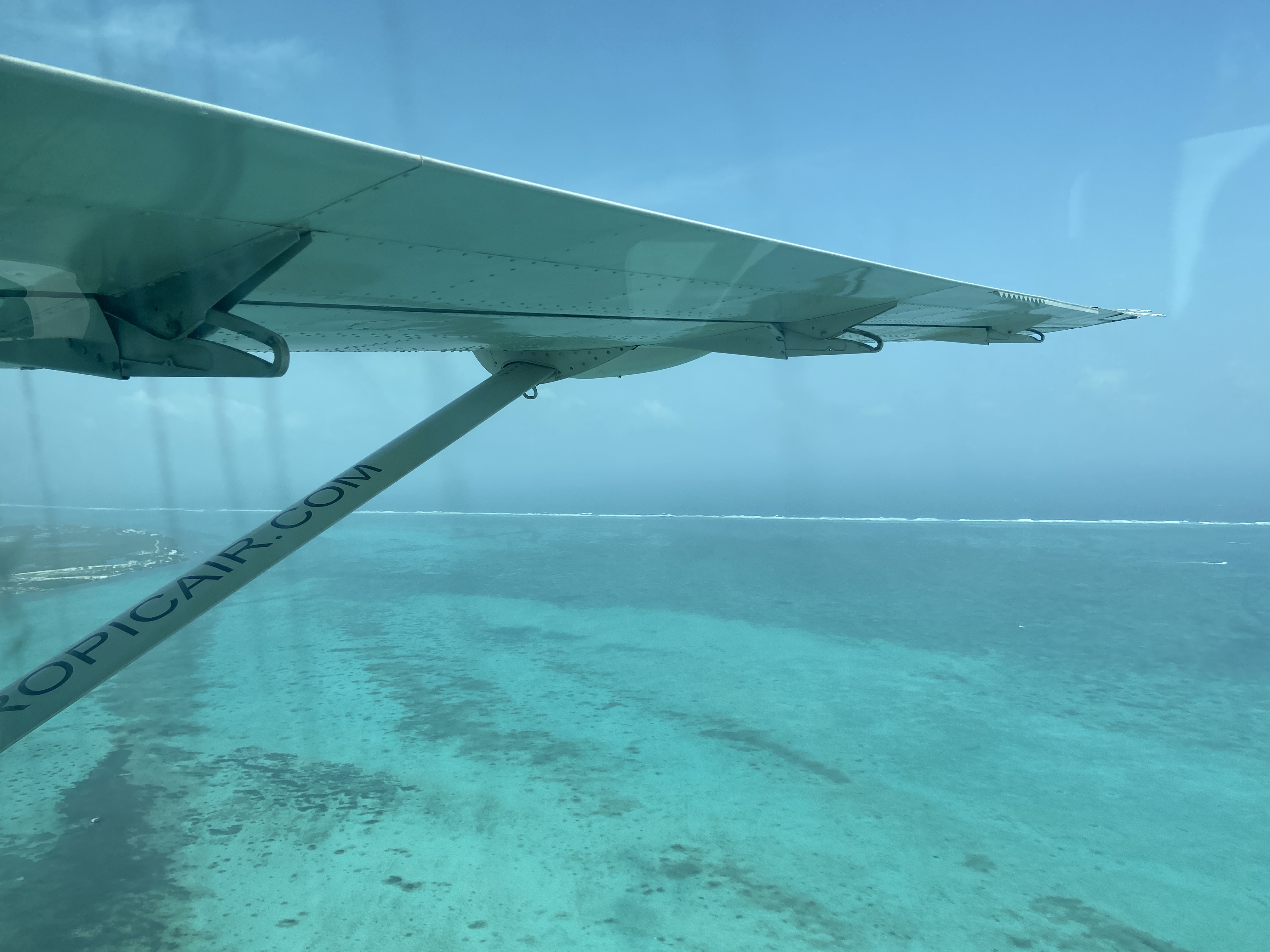 Landing on Island, Barrier Reef in Background